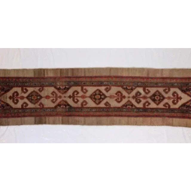 This master piece is a Wool pile genuine hand made very fine antique Persian Bakhshaish with camel hair runner-