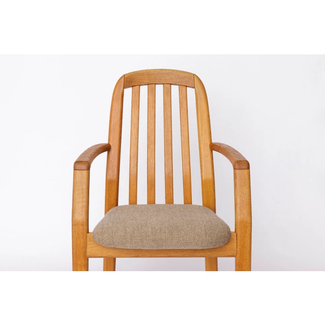 Vintage Oak Armchair by Dyrlund, 1970s A total of 5 chairs are available. Crafted from solid oak, the frames have been...