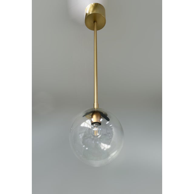 Italian Uno Satin Brass Clear Globe Pendant by Fabio LTD For Sale - Image 3 of 6