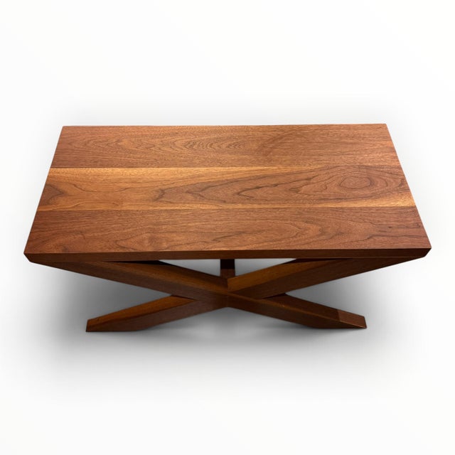 Beautifully crafted custom bench in a classic X-form. The material and form make this a truly versatile piece- from the...