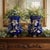 An exceptionally striking pair of antique cobalt blue faience jardinieres or decorative urns, richly detailed with...