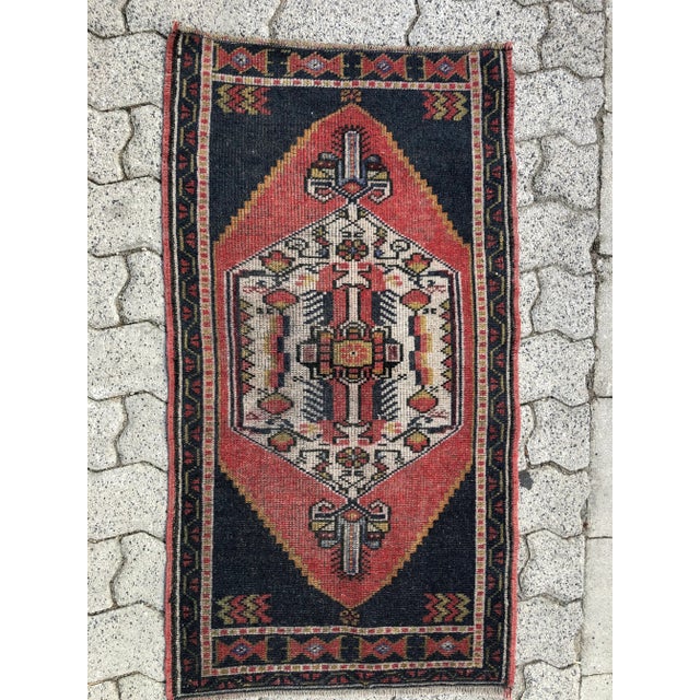 This is a vintage Turkish Oushak rug from the 1960s. The piece was hand-knotted.