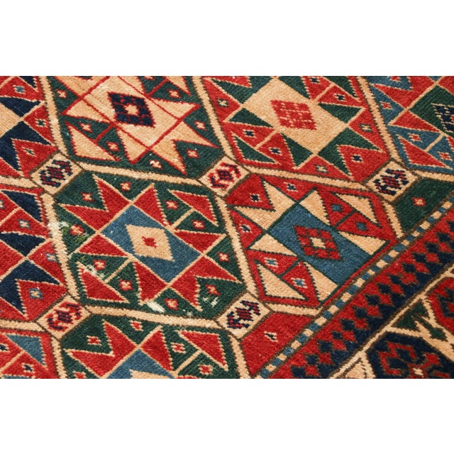 Hand-knotted in wool and originating from Turkey circa 1910-1920, this 4x6 antique rug is among some of the most...