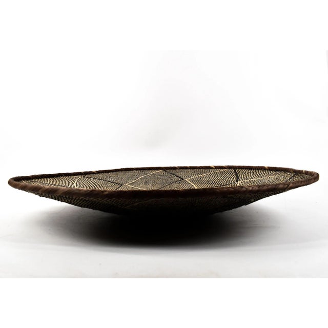 Tonga Binga baskets are traditional handcrafted baskets made by the Tonga women of Binga district in Zimbabwe. Crafted...