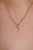 This elegant solitaire pendant features a 0.24 carat diamond set in 14k yellow gold. The diamond measuring 4.2 x 4.7 mm,...
