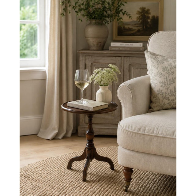 Elegant vintage Georgian Revival wine table crafted in rich mahogany with a classic tripod base and turned pedestal. Its...