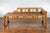 A Chinese Qing Dynasty period wooden lady's opium bed from the 19th century, with rattan seat, pillow, two small drawers...