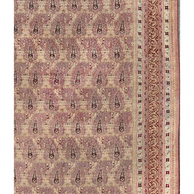 Antique Indian Amritsar rug with all-over Paisley pattern in ivory, pink, Lavender, purple, Cream, light yellow & red....