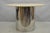 Vintage Mid Century Modern Round Cream Travertine Stone Top Chrome Steel Pedestal Base Dining Table after Pace. Circa Late...