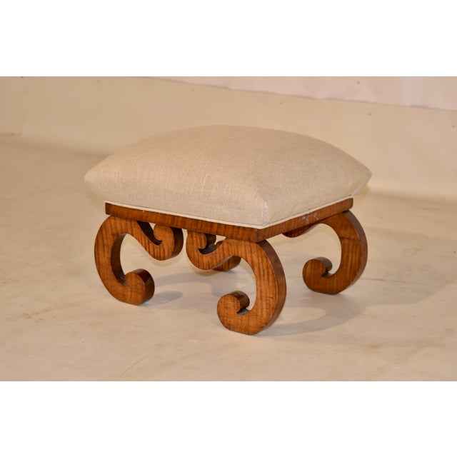 19th century American tiger maple stool with newly upholstered seat in linen. This is a lovely stool with a pyramid box...
