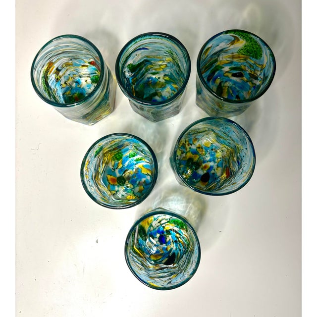 Striking set of six hand-blown Murano art glass tumblers in the Venetian goti de fornasa tradition. Each glass is...