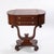 Empire revival lyre form mahogany sewing stand with 2 drawers and lift top side compartments.
