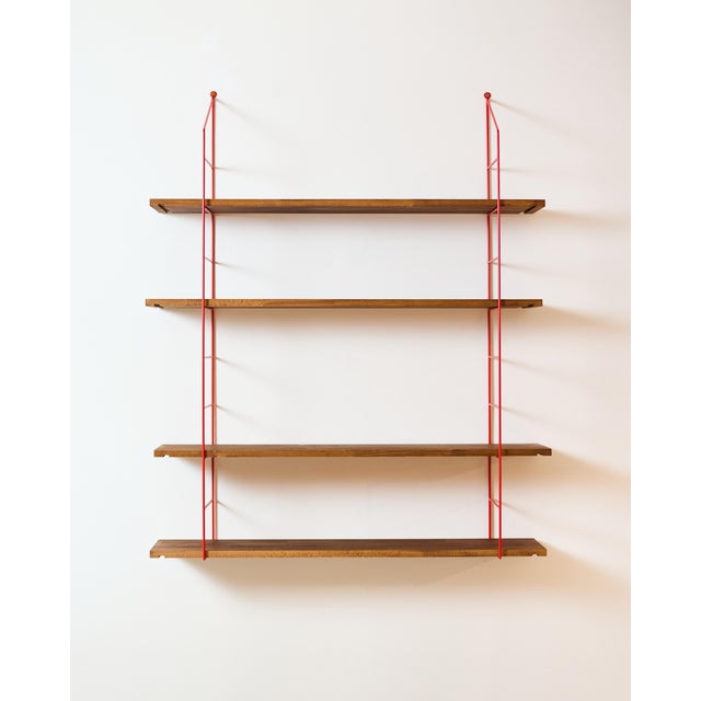 Red Shelving System with 4 Wooden Shelves, 1970s, in Restored conditions. Designed 1970 to 1979