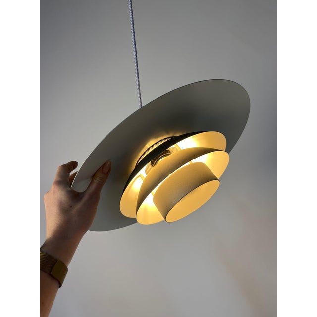 The de-lux pendant lamp by design light is a distinctive piece of danish lighting history, fascinatingly exploring the...