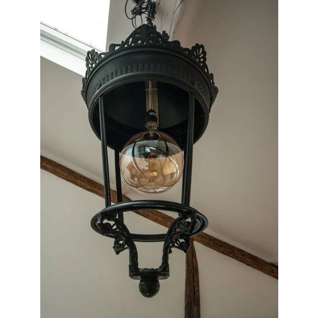 Large street lamp of the brand Lenzi. Model "Street of Peace" cast matt black aluminum. Electrification refurbished,...