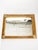 Decorative French rattan wall mirror dating from the 1990s. The rectangular mirror is surrounded by a structured frame...