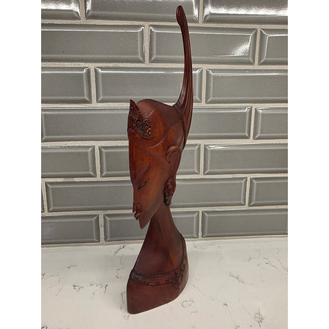 An exceptional, gallery-grade mid-century Balinese modernist portrait bust depicting an elegant noble maiden. Standing a...
