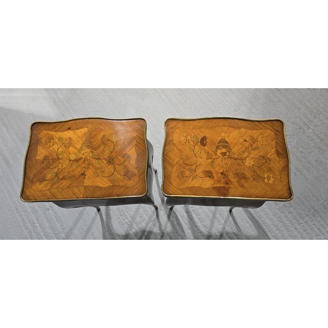 A very nice pair of oversized three drawer marquetry bedside lamp tables with brass knobs and brass rim, in overall very...