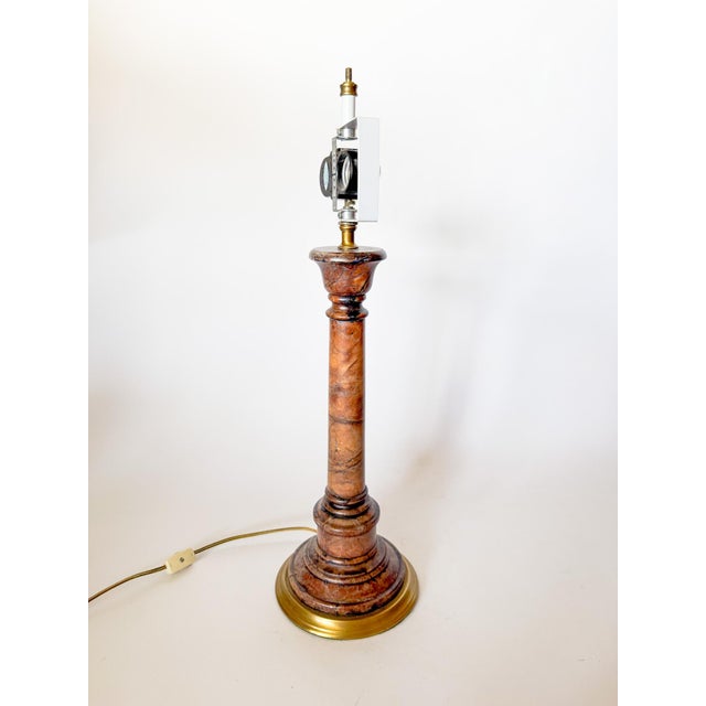 Stunning vintage rust colored alabaster marble column table lamp. Features double sockets for a brighter lamp light. Gold...