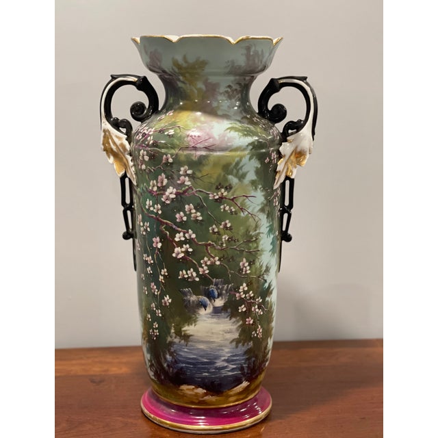 Germany, early 20th century, 23” H porcelain tall vase , hand painted Colorful grounds and scenes of birds and butterfly...