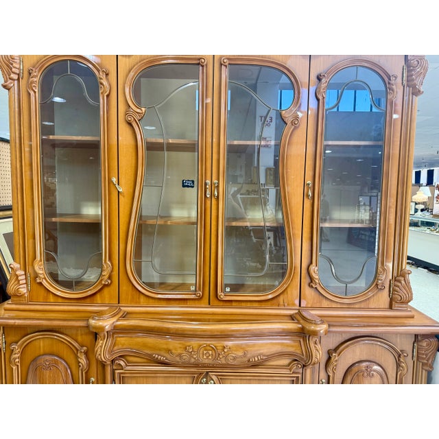 Bring timeless Italian sophistication to your home with this stunning Rococo Revival dining suite handcrafted in Pesaro,...