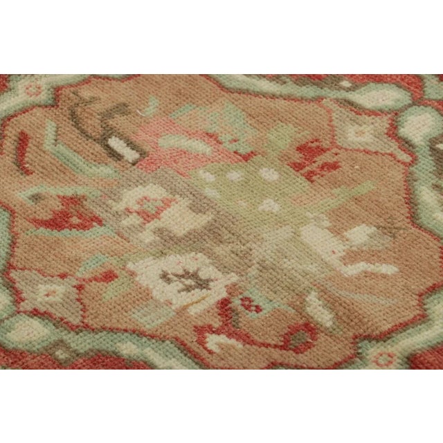 Made with hand-knotted wool, this 2x3 gift-sized vintage Turkish rug originating circa 1950-1960, is from the collection...