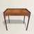 The Georgians knew that even a useful table deserved a little seduction. This English mahogany silver table from the late...