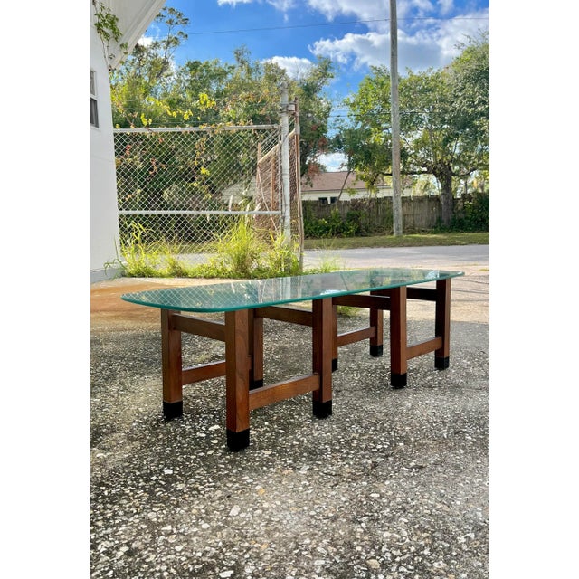Walnut Double Pedestal Base Rounded Rectangular Coffee Table With Glass Top. This coffee table is quite versatile. A...