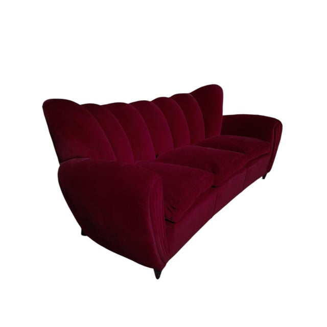 This living room set consists of a three-seater sofa and two vintage armchairs from the 1950s, attributed to Guglielmo...