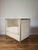 The Meredith Chair made by Bernhardt Interiors has a high back curved chair club chair that is trimmed in a metal faux...