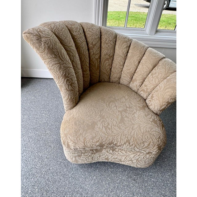 A striking pair of sculptural "Seashell" lounge chairs, exemplifying the 1980s Postmodern movement's sophisticated take on...