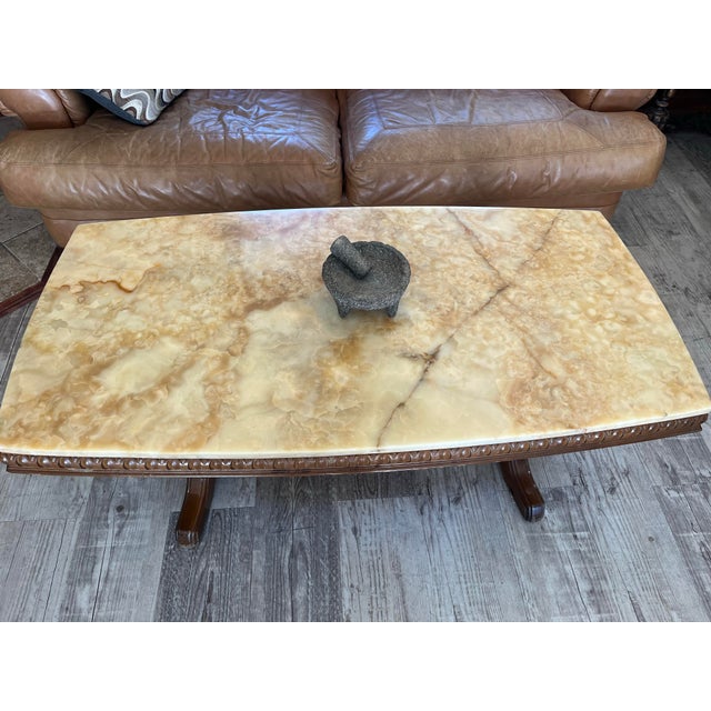 Wilhelminian-Style Coffee Table Features a Polished Honey-Toned Onyx or Marble Slab Top Resting on an Ornately Carved Double-Pedestal Wooden Base For Sale - Image 12 of 12