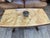Wilhelminian-Style Coffee Table Features a Polished Honey-Toned Onyx or Marble Slab Top Resting on an Ornately Carved Double-Pedestal Wooden Base For Sale - Image 12 of 12