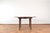This round dining table was produced in the 1960s in Poland by Jarocińskie Fabryki Mebli. The table is veneered with oak...