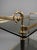 A seriously chic slice of vintage glam, this Hollywood Regency brass and smoked glass trolley brings all the low-lit...