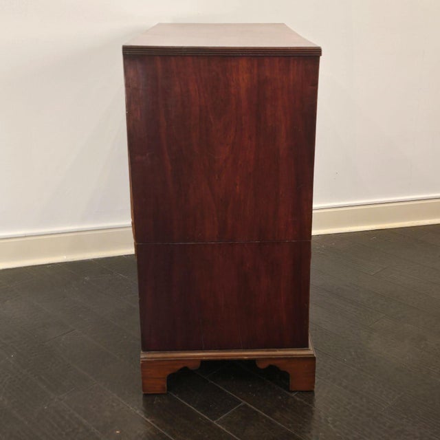 A George III–period mahogany chest of drawers, circa 1790.
