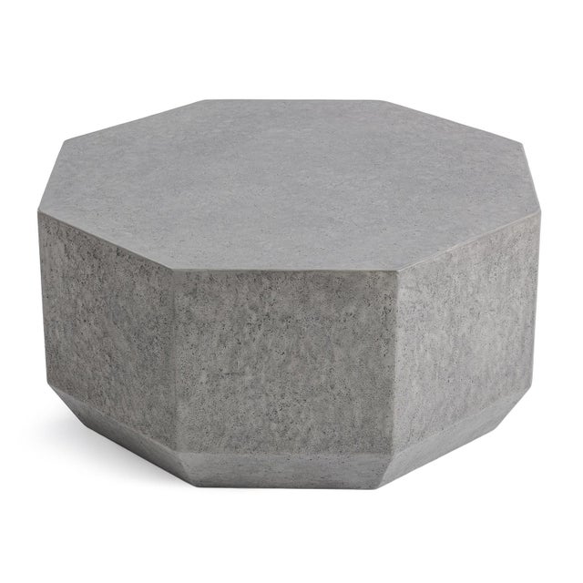 Modern octagonal lightweight concrete outdoor coffee table. Clean geometrical minimalist design and sculptural presence....