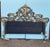 This is an early 20th century antique headboard in the Rococo style. It has elements of gold leaf on the front and back...
