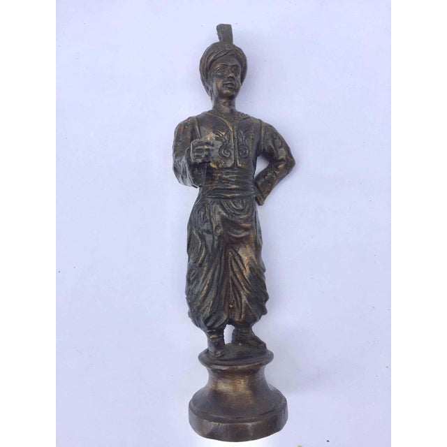 Moorish Turkish man dressed in Ottoman Empire-style costume and turban. An orientalist Moorish patinated cast bronze...