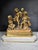 This elegant 19th-century gilded bronze sculptural group is a stunning piece of art. It is mounted on white Carrara...