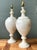 These vintage alabaster urn-form lamps bring a softly luminous presence to a room, pairing creamy stone bases with aged...