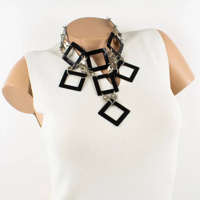 Paco Rabanne, Paris, designed this stunning geometric Space Age chocker necklace circa 1960. The piece features black...