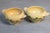Two small 19th century French yellow glazed pottery drinking bowls from the town of Innimont, with stylized foliage...