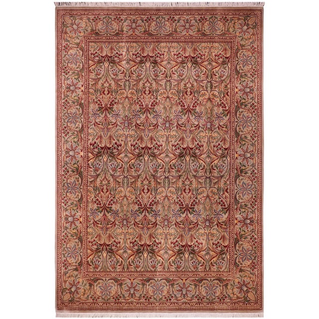 Designed with mesmerizing intricacy and gorgeous color palette, this hand-knotted masterpiece demonstrates the beauty and...