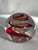 1960's Italian clear glass paperweight with red and gold aventurine swirl / spiral inclusion.