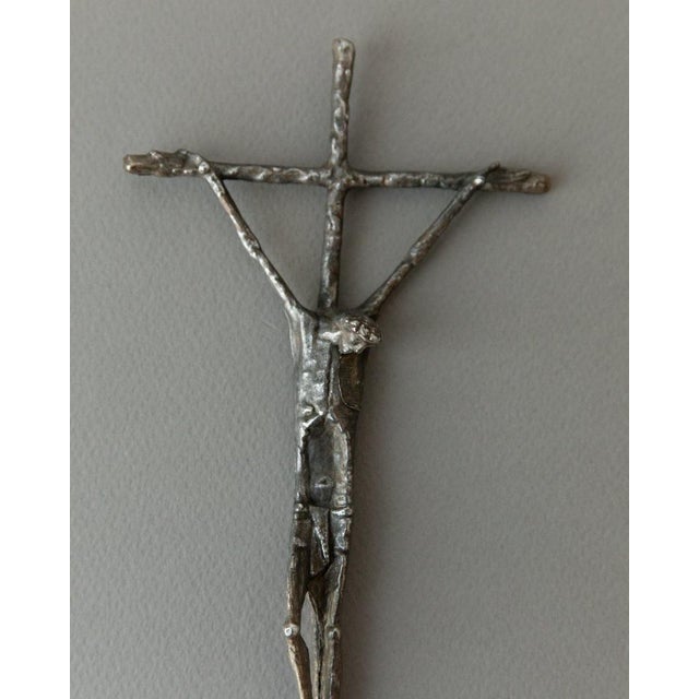 This vintage bronze crucifix was designed by e. Huber and was issued for the 1983 catholic day in austria. It shows jesus...