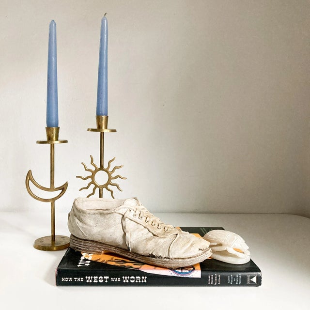 From the brilliant mind and hands of ceramicist Marilyn Levine comes this untitled (shoe) sculpture. Ms. Levine's artwork...