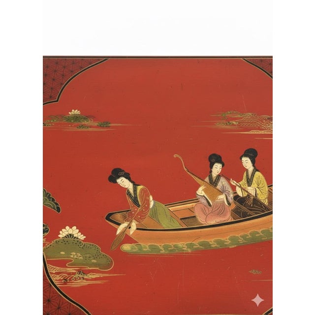 This highly collectible set of four tables is a dramatic statement piece, embodying the height of the Chinoiserie...