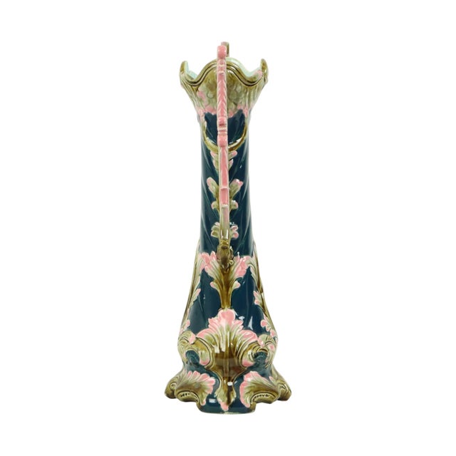 Ceramic vase made of majolica earthenware, elaborately decorated with a typical Art Nouveau design, leaves, stems, and...