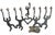 Dancing men figures in a cut steel art Menorah. Iron Steel construction. Inspired by Keith Haring modernist pop art....